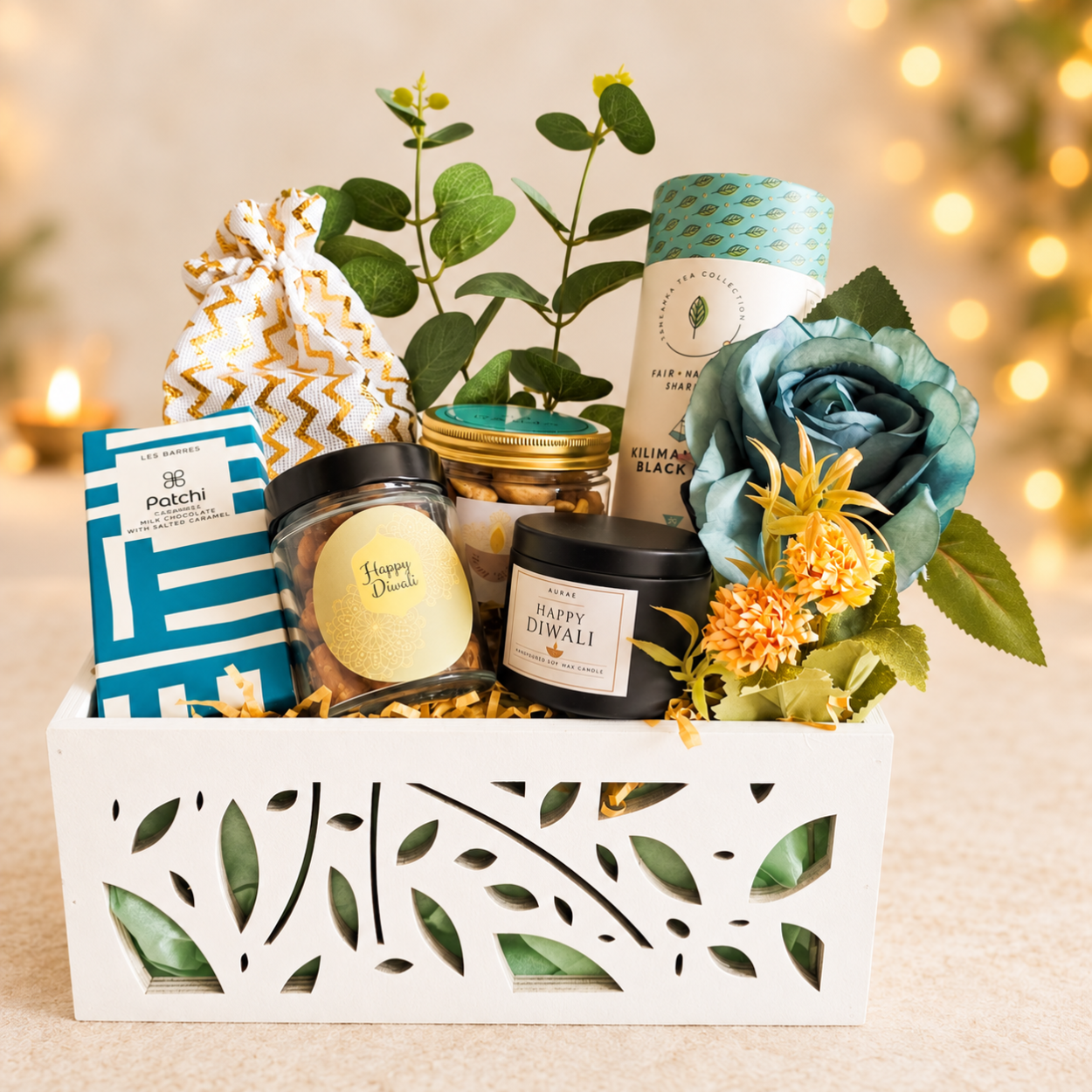 Turquoise Diwali Temptation gift box with Patchi chocolate Guylian and twin diyas Dubai